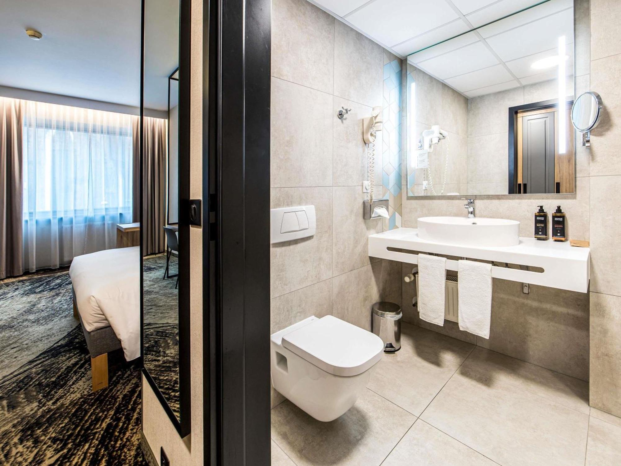 Privilege Room newly renovated with double bed and sofa, City or Cathedral View