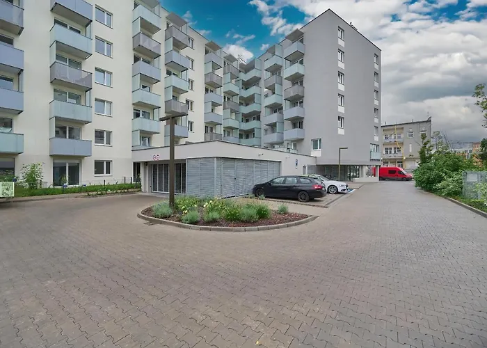 Black And Beige Apartment With Balcony And Parking In Wroclaw By Noclegi Renters